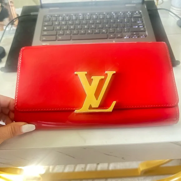 Vibrant LOUIS VUITTON Red Clutch with Gold Accent - Picture 1 of 7